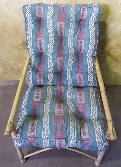 A FANTASTIC SINGLE SEATER CANE COUCH FOR THE PATIO