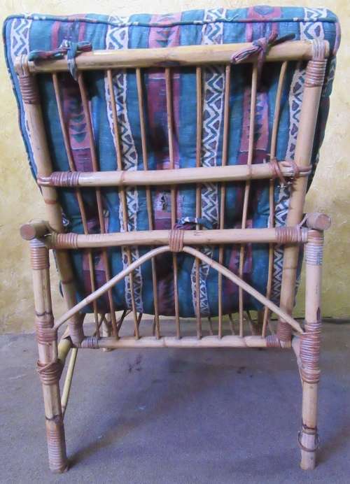 A FANTASTIC SINGLE SEATER CANE COUCH FOR THE PATIO