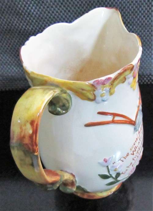 Being offered is a marvelous English pitcher marked 1045-2 MADE IN ENGLAND BESWICK ENGLAND.