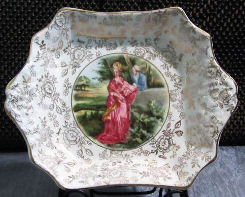 This is a lovely  dish by James Kent Longton Romance beautiful roses and a gilt chintz pattern