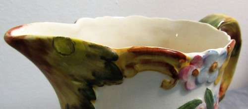 Being offered is a marvelous English pitcher marked 1045-2 MADE IN ENGLAND BESWICK ENGLAND.