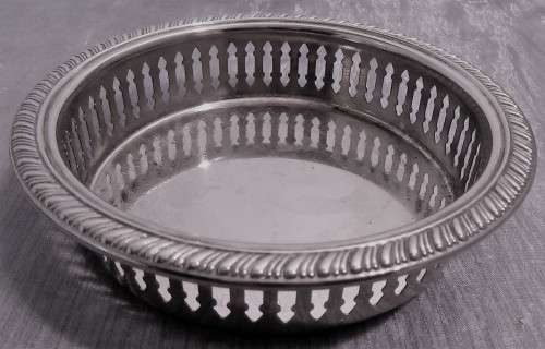 Two Vintage silver plated engraved, galleried champagne or wine bottle coaster