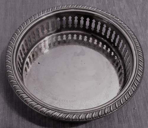 Two Vintage silver plated engraved, galleried champagne or wine bottle coaster