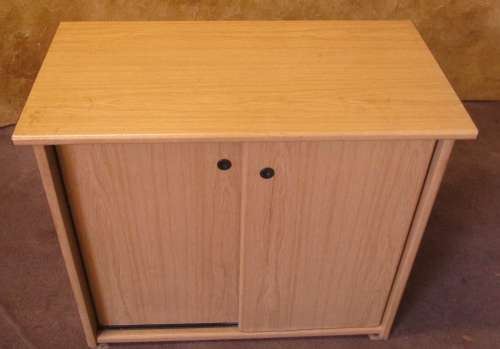 A FANTASTIC FILING CUPBOARD WITH TO SLIDING DOORS PERFECT FOR A HOME OFFICE