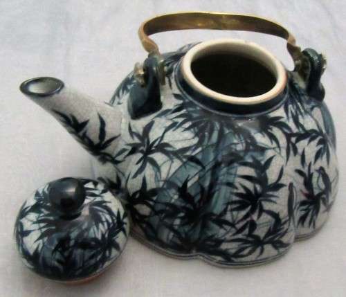 A BEAUTIFULLY DESIGNED TEA POT - HAND PAINTED IN THAILAND