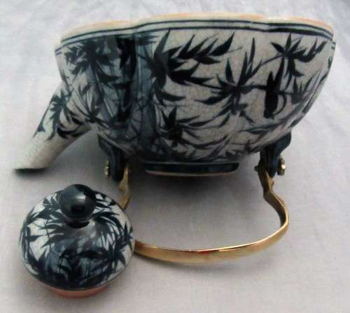 A BEAUTIFULLY DESIGNED TEA POT - HAND PAINTED IN THAILAND