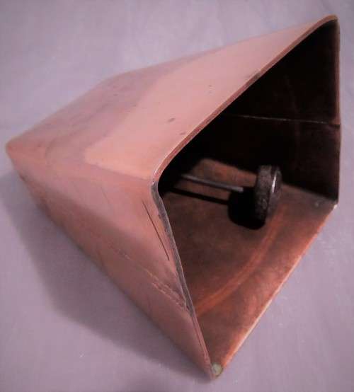 A STUNNING FIND A ANTIQUE COPPER COW BELL WITH THE RINGER