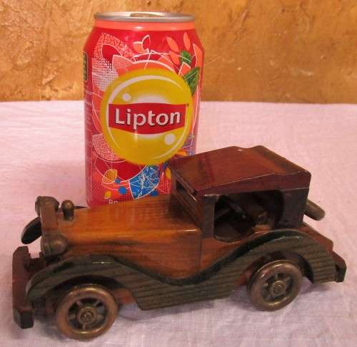 Vintage wooden hand made toy car, unpainted.