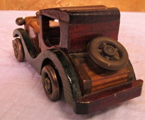 Vintage wooden hand made toy car, unpainted.