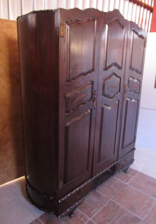 A VERY DIFFERENT IMBUIA 3 DOOR WARDROBE WITH ROUNDED SIDES AND BEAUTIFUL BRASS DETAIL