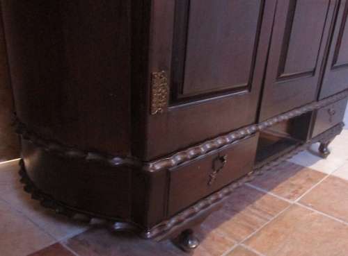 A VERY DIFFERENT IMBUIA 3 DOOR WARDROBE WITH ROUNDED SIDES AND BEAUTIFUL BRASS DETAIL