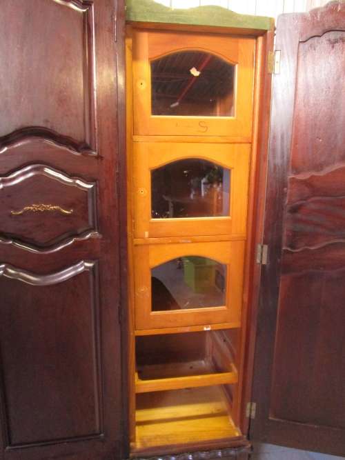 A VERY DIFFERENT IMBUIA 3 DOOR WARDROBE WITH ROUNDED SIDES AND BEAUTIFUL BRASS DETAIL