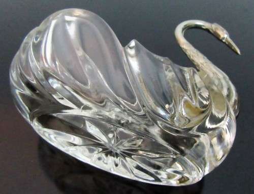 A vintage glass swan salt cellar or ring dish in good shape with a silver plated neck and head