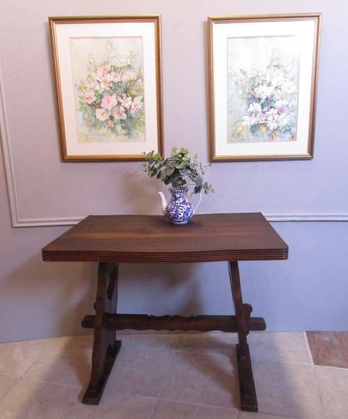 A LOVELY FOUR SEATER WITH STUNNING LEGS WITH A HEART CUT OUT IN THE LEGS