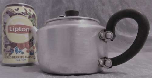 AN AMAZING SMALL TEA POT VERY USEABLE WITH THE TREND OF GAS STOVES