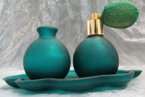 Fascinating perfume bottle set with an atomizer from 1970s. Looks wonderful on a dressing table