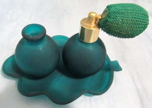 Fascinating perfume bottle set with an atomizer from 1970s. Looks wonderful on a dressing table