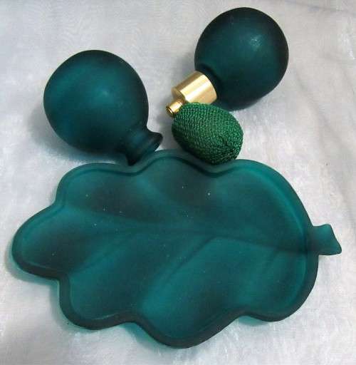 Fascinating perfume bottle set with an atomizer from 1970s. Looks wonderful on a dressing table