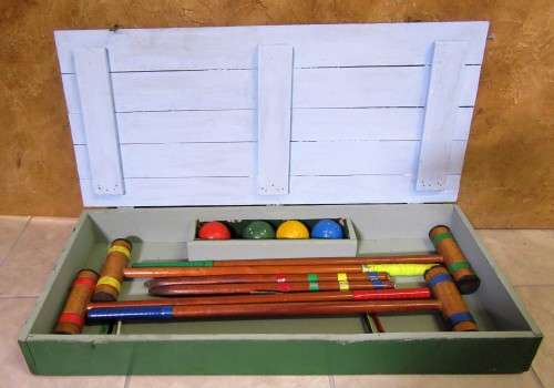 1950s Croquet Set. This set is for four players or less. It has four mallets, four balls,