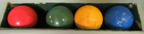 1950s Croquet Set. This set is for four players or less. It has four mallets, four balls,
