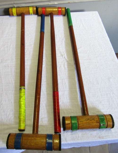 1950s Croquet Set. This set is for four players or less. It has four mallets, four balls,