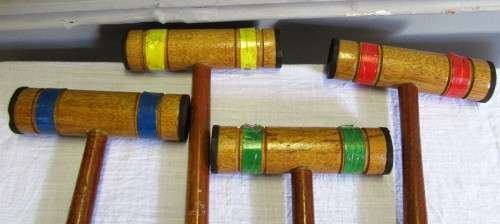 1950s Croquet Set. This set is for four players or less. It has four mallets, four balls,