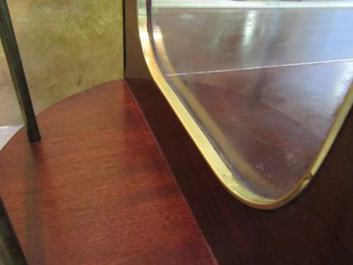 A VERY DIFFERENT IMBUIA BALL & CALW GLASS CABINET WITH A MIRROR AT THE BACK FINISHED OF WITH BRASS
