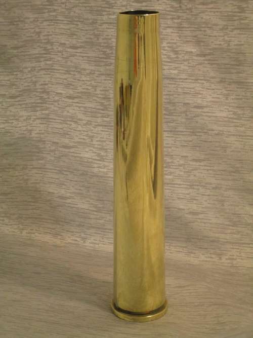 A COLLECTORS 40M.M.MK4 1956 EMTY SOLID BRASS BULLET SHELL