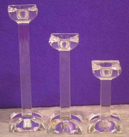 A COLLECTION OF THREE ONEIDA CRYSTAL PILLAR CANDEL HOLDERS ELGANT & STYLISH