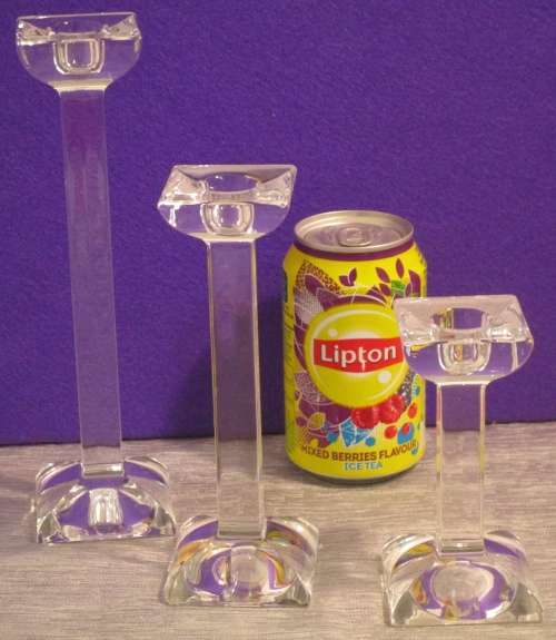 A COLLECTION OF THREE ONEIDA CRYSTAL PILLAR CANDEL HOLDERS ELGANT & STYLISH