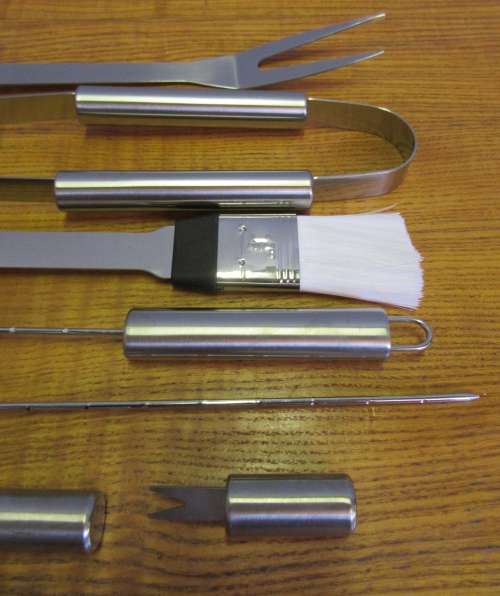 A FABULOUS STAINLESS STEAL BRAAI SET IN A BAG NEVER BEEN USED