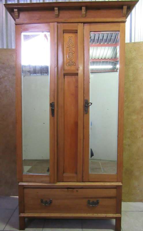A GORGEOUS 1920'S ARTS AND CRAFTS WARDROBE WITH BEAUTIFUL CARFT DETAIL