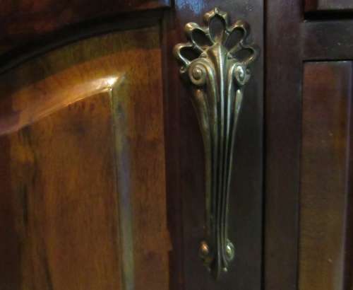 A stunning Three door solid Imbuia wardrobe with solid brass embellishments & ample space