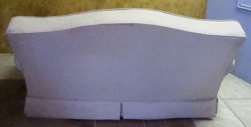 A VERY COMFORTABLE 2 SEATER COUCH IN GOOD CONDITTION