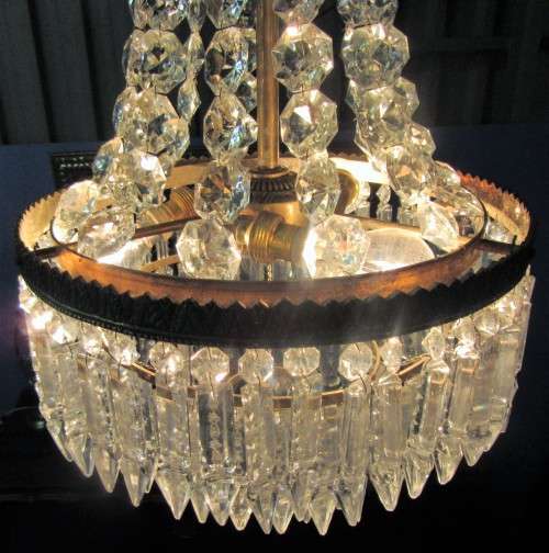 This is Antique French Style basket style brass & crystals 3 bulp chandelier. Tested & Working -