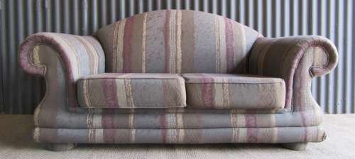 A VERY COMFORTABLE 2 SEATER SOFA FABRIC IS FAIR ONE OR TWO SCUFS - OR FOR RECOVERY