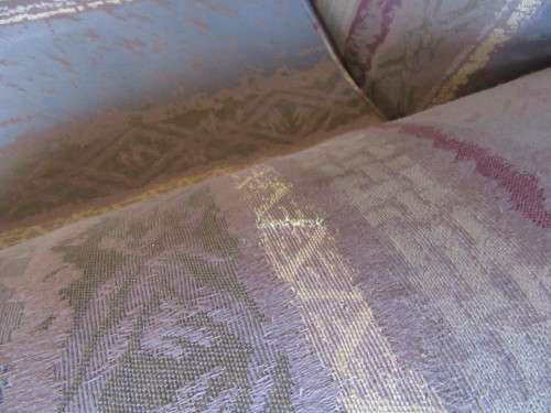 A VERY COMFORTABLE 2 SEATER SOFA FABRIC IS FAIR ONE OR TWO SCUFS - OR FOR RECOVERY