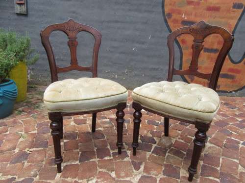 Pair of Victorian Mahogany Dining room chairs with beautiful carved detail