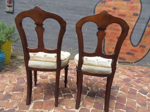 Pair of Victorian Mahogany Dining room chairs with beautiful carved detail
