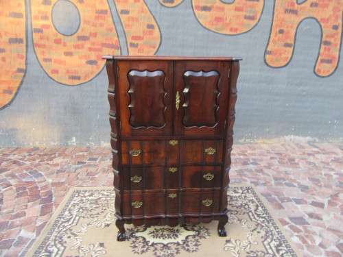 A beautiful Stinkwood ball and claw `Tallboy` multi-purpose cabinet with 3 drawers