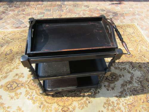 Three-tier tea trolley with barley twist legs and serving tray with a top glass top.