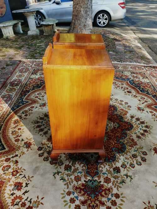 Pair of tall Art Deco wall nut finished pedestals