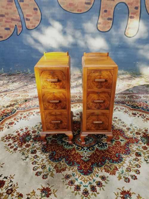 Pair of tall Art Deco wall nut finished pedestals