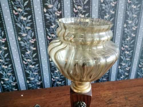 Vintage wooden table lamp with a glass shade