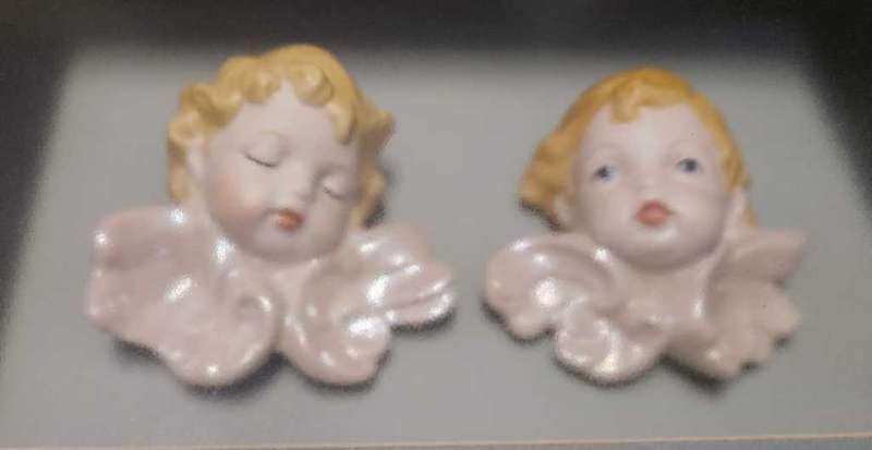Exquisite boxed frame featuring delicate porcelain angels
