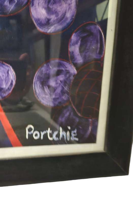 Framed Porchie Print behind glass