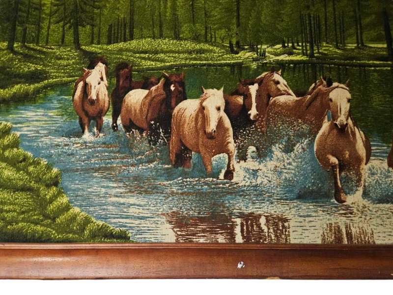 Vintage tapestry in a wooden frame
