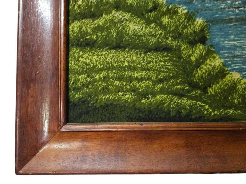 Vintage tapestry in a wooden frame