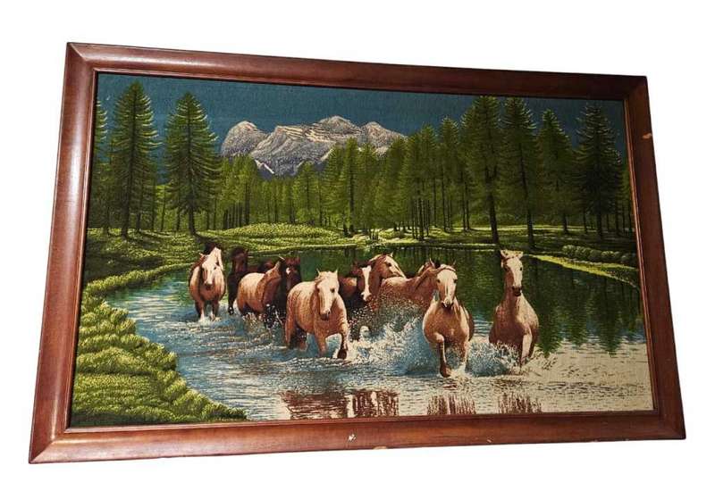 Vintage tapestry in a wooden frame