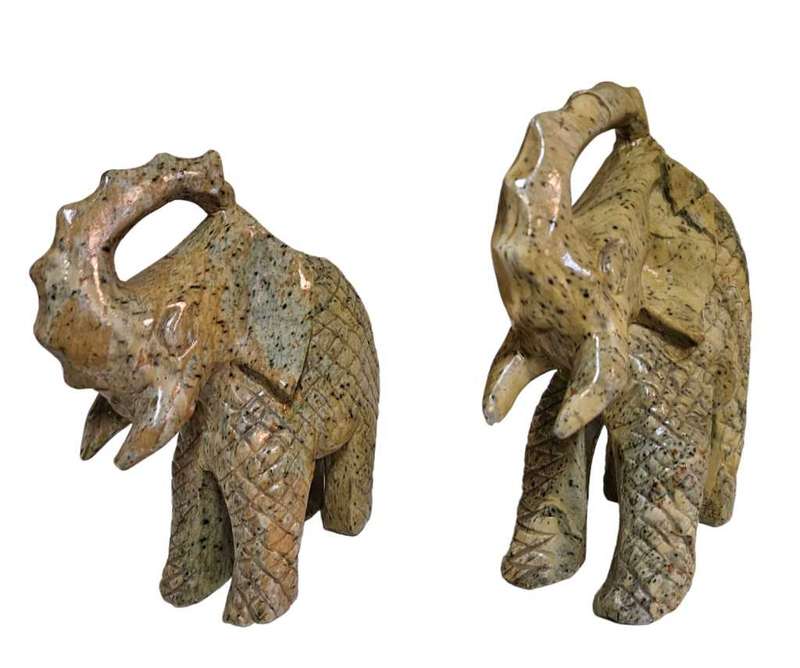 Pair of heavy hand-carved stone elephants